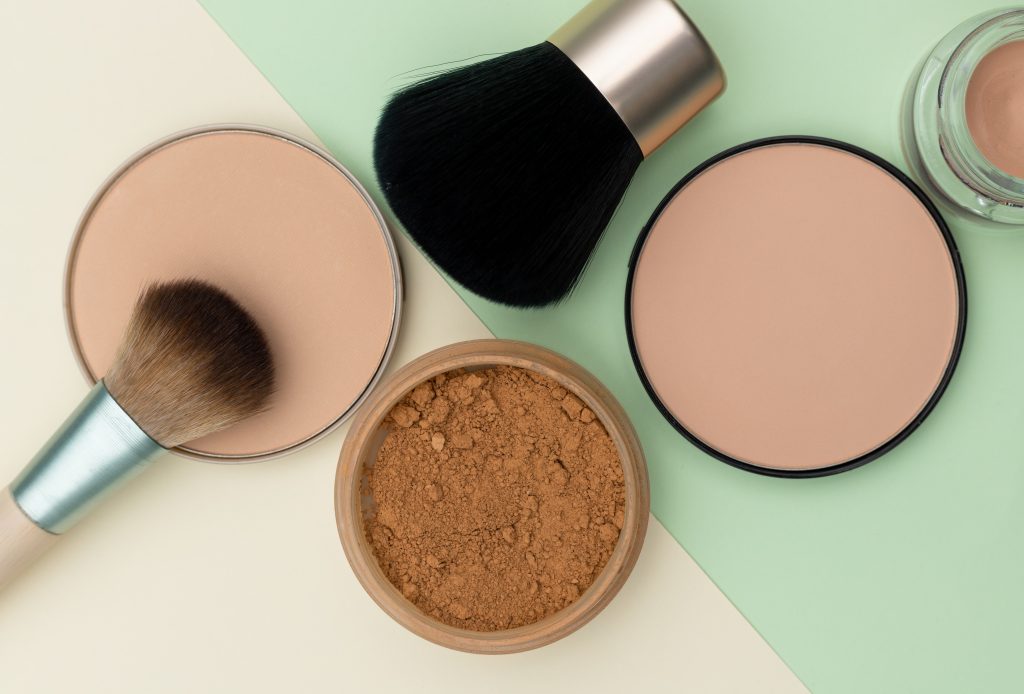 Compact face powder and brushes