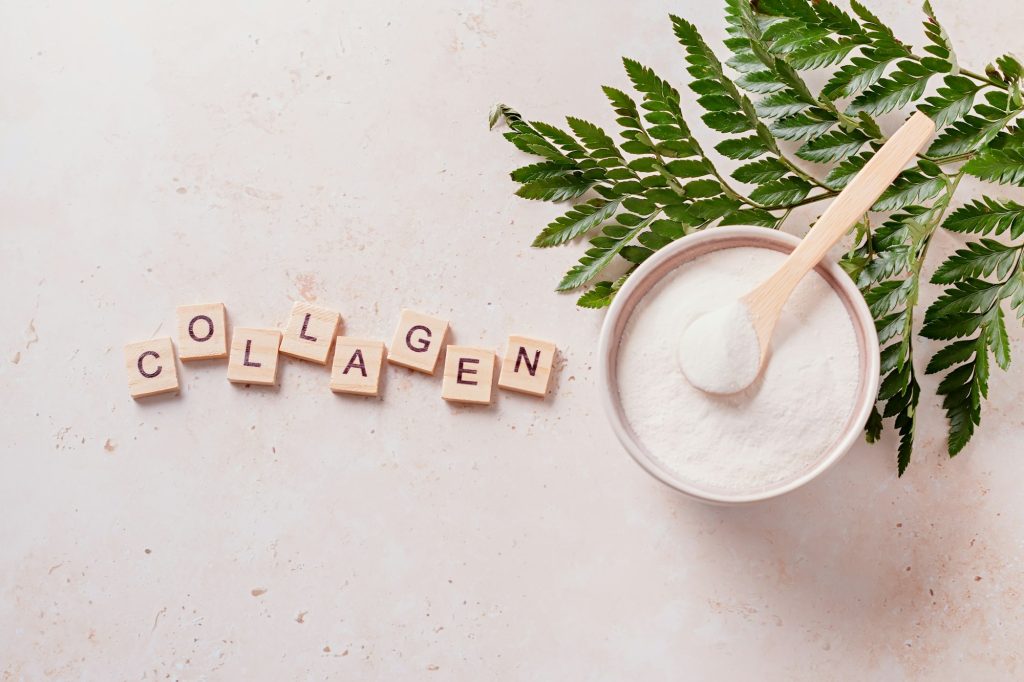 Collagen powder and quote collagen made of wooden blocks, top view