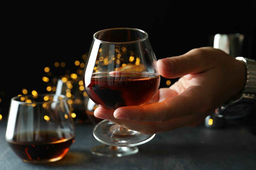 Concept of hard alcoholic drinks with cognac