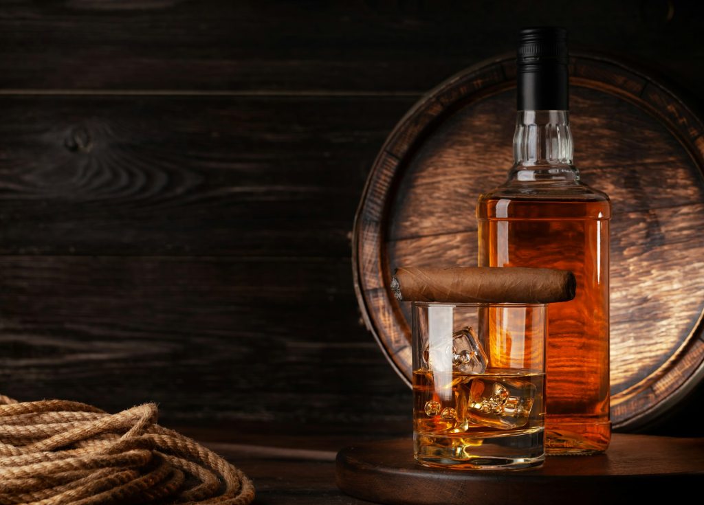 Glass and bottle with cognac